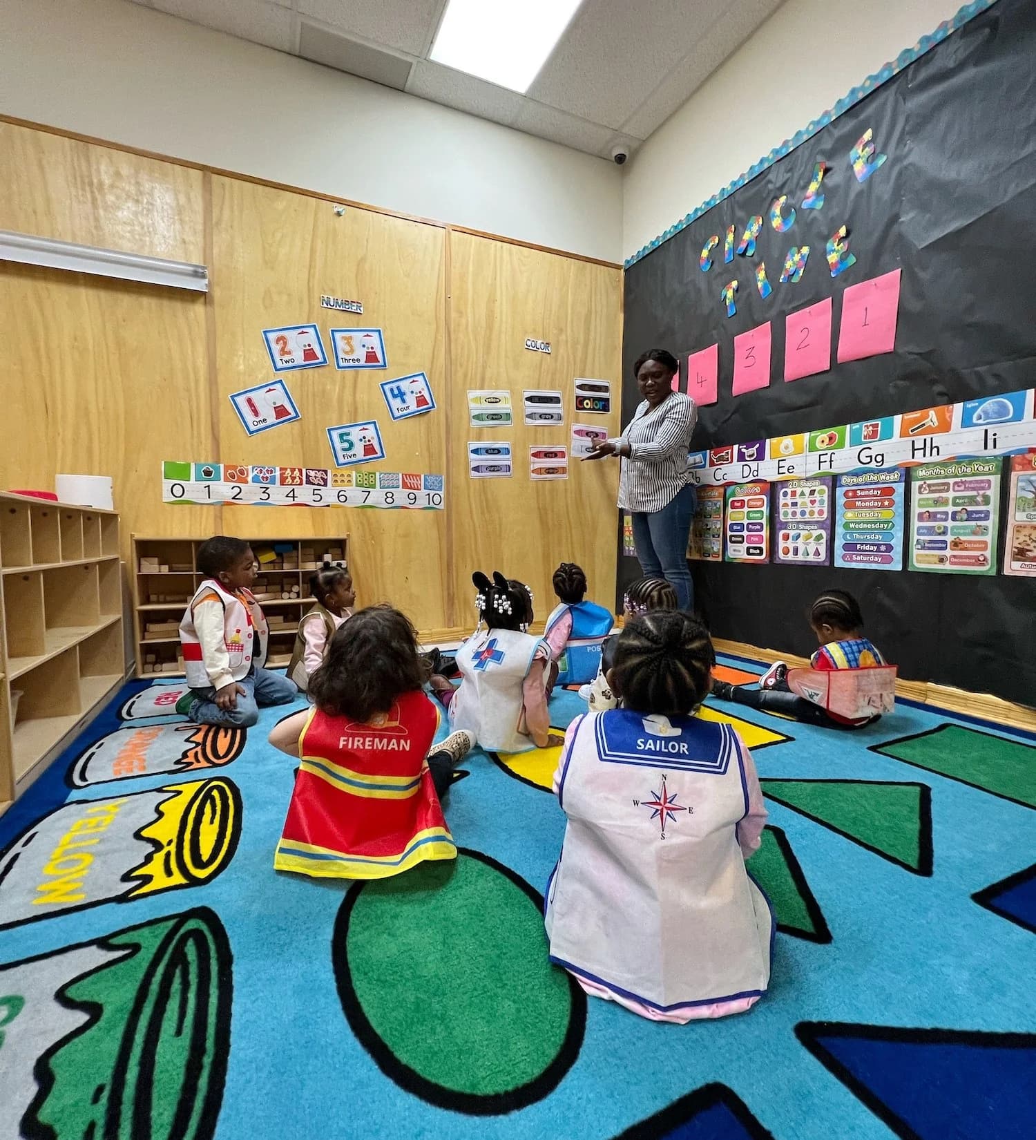 Bilingual children during circle time at Einstein Daycare in East Flatbush Brooklyn